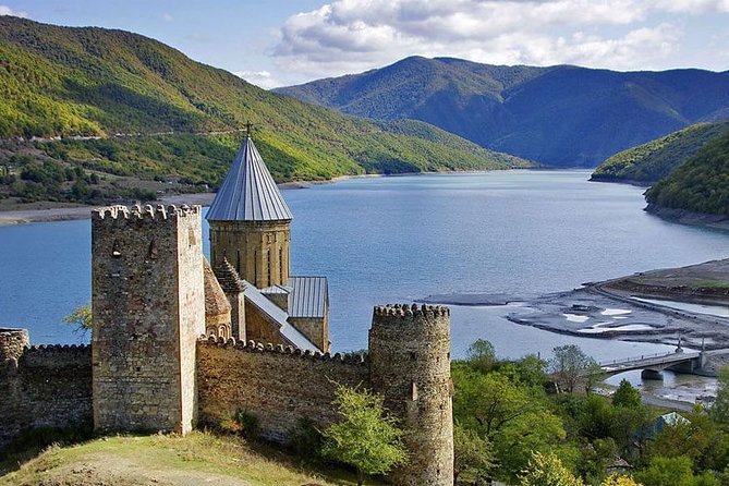 Adventure in Caucasus – Private Tour to Jinvali, Ananuri, Gudauri, Kazbegi - Jinvali Water Reservoir: Quick Coffee, Colorful Forest Views, Great Photo Angles