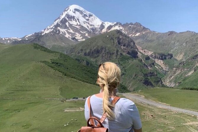 Day tour to mountains Jinvali lake, Ananuri, Kazbegi, Arch friendship - The Treaty of Georgievsk Monument: a round marker on Devil’s Valley