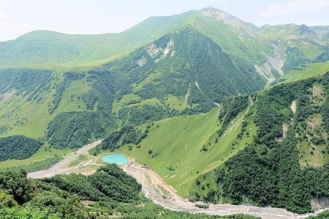 Kazbegi-Ananuri-Gergeti Private Tour - Stop 3: Gudauri Friendship Monument, Soviet mosaics with mountain views