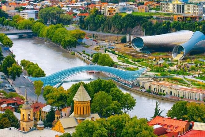 Old Tbilisi Tour: Private Walking Tour With Wine Tasting - Narikala’s split-screen view: city noise and botanical quiet