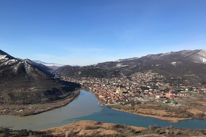 Private Day Trip to Gudauri and Kazbegi from Tbilisi via Jvari and Mtskheta - Ananuri Fortress by Jinvali Dam: where the road becomes a storybook