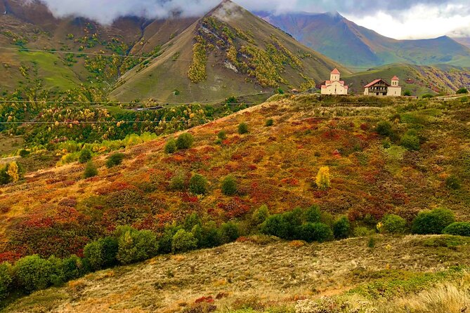 Private Kazbegi and Gudauri Mountain Tour - Gergeti Trinity Church at 2,170 meters: the iconic Kazbegi payoff