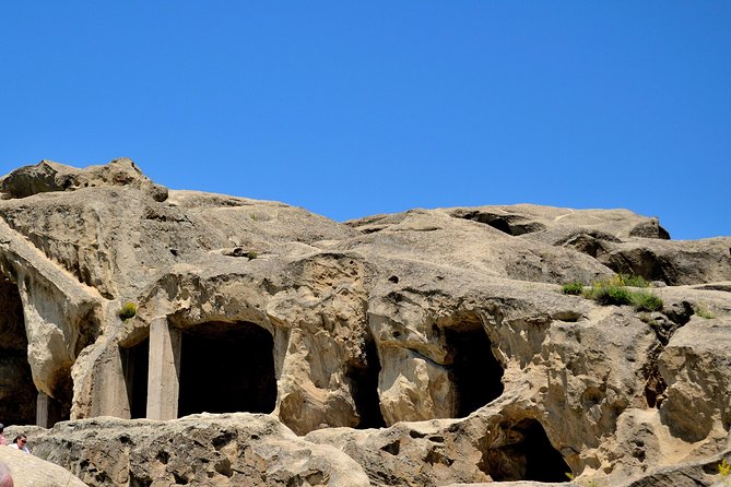 Private Tour to Mtskheta Stalin Museum Uplistsikhe Caves - Uplistsikhe Cave Town: walking through rock-carved rooms