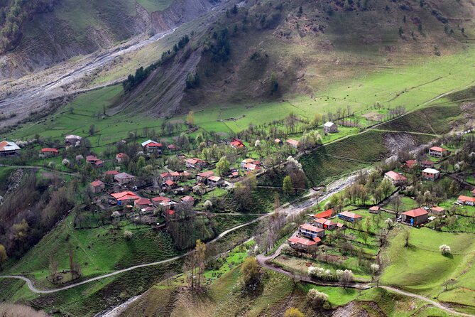 Tbilisi to Kazbegi, Gudauri, and Ananuri Day Tour - Zhinvali Dam in Aranisi: Concrete, Water, and Quick Photo Time