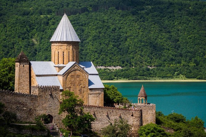 To The Majestic Kazbegi Full Day tour - Zhinvali Water Reservoir: blue water, mountains, and a Soviet-era dam story